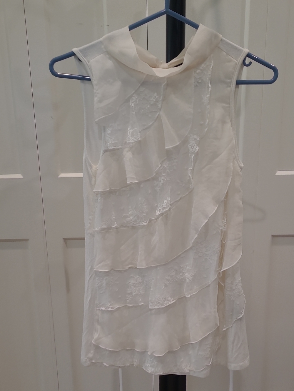 Alexandra Bartlett Ivory Sleeveless Ruffle Tier Top